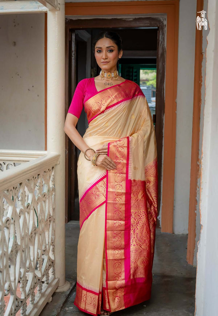 Cream Pure Kanjivaram Silk Saree with Pink Border