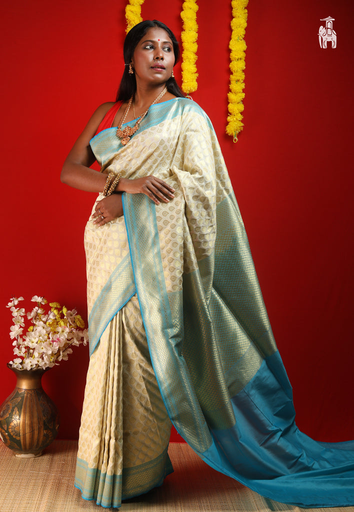 Off White Katan Silk Saree with Blue Border