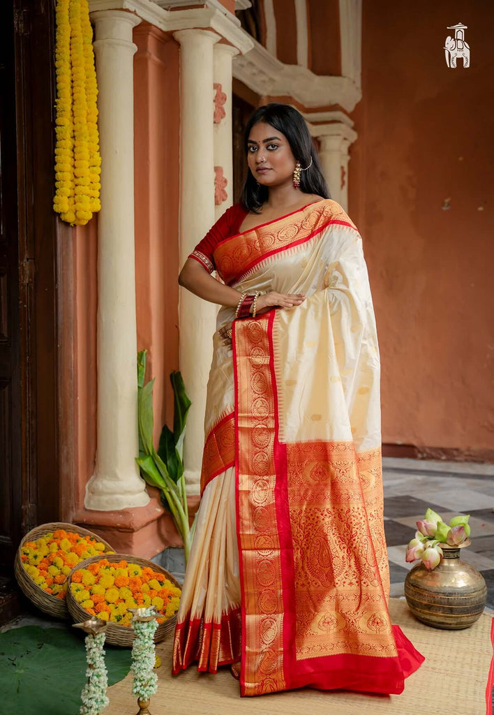 Off White Pure Kanjivaram Silk Saree with Red Border