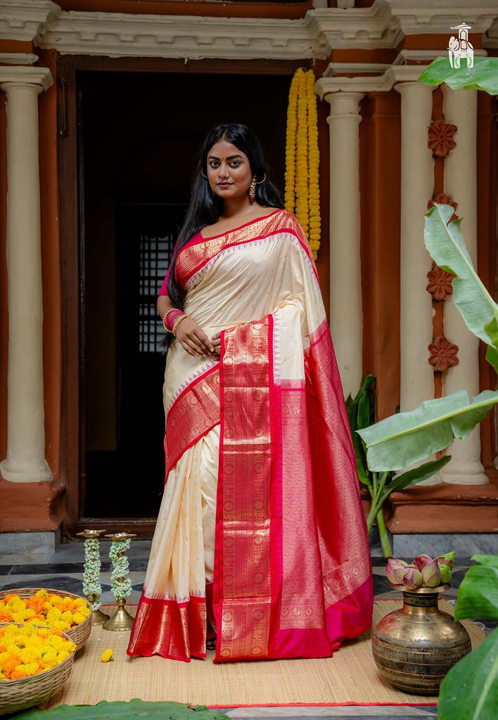 Off White Pure Kanjivaram Silk Saree with Pink Border