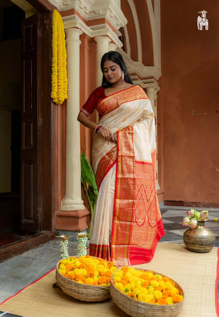 Off White Pure Kanjivaram Silk Saree with Red Border